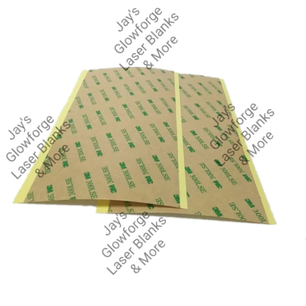 Stack of 3M 300LSE Adhesive Sheets.